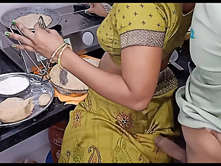 Indian desi aunty making food in Kitchen our husbXXX went to come sex XXX cow girl style sex with hot boobs